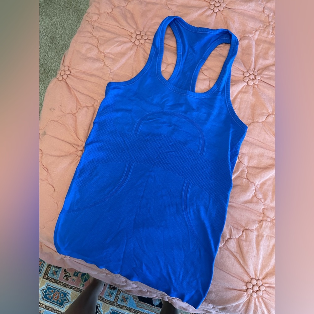 Lululemon Swiftly Tech racerback tank, original length. Size 4.